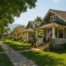 Scenic view of a quiet residential neighborhood in Exeter, CA with tree-lined streets and mountain backdrop, symbolizing peaceful small-town living in 2025.